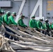 U.S. Sailors conduct a barricade drill