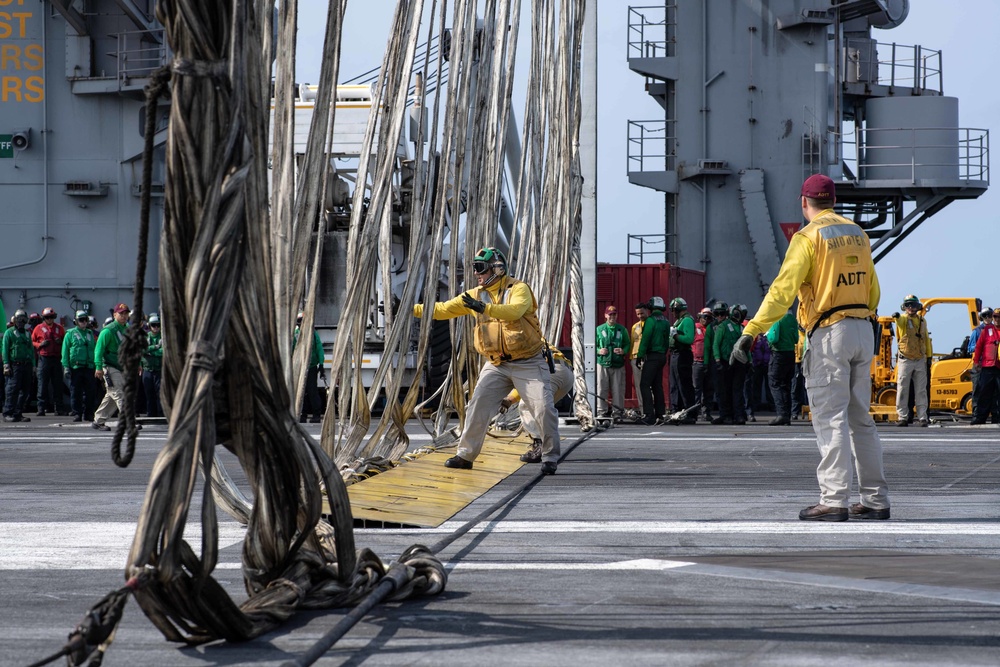 U.S. Sailors conduct a barricade drill