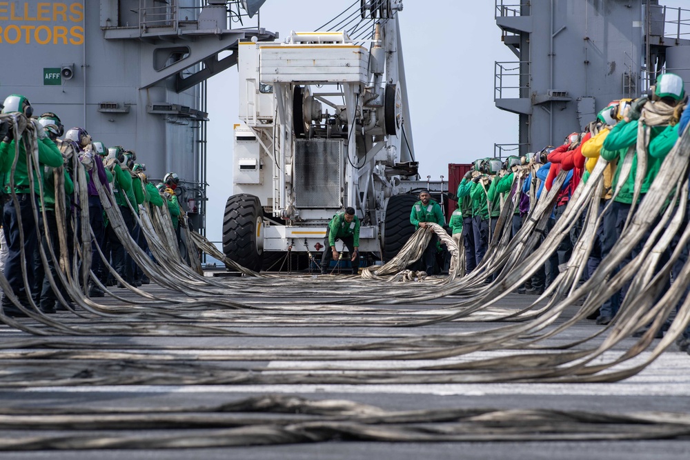 U.S. Sailors conduct a barricade drill