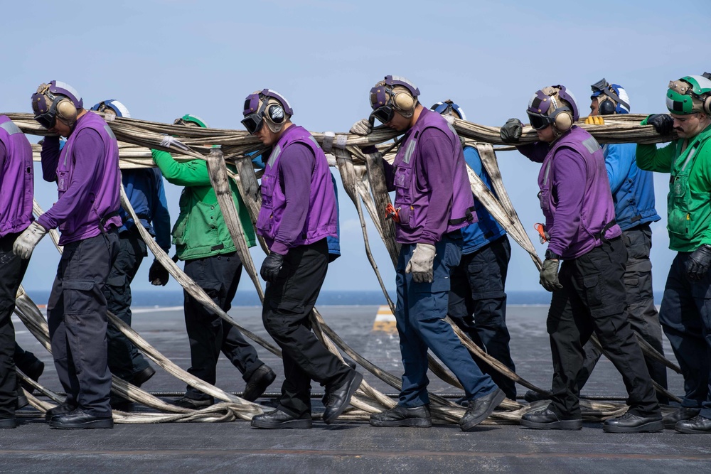 U.S. Sailors conduct a barricade drill