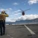 A MH-65D Is Signaled Aboard USS Somerset