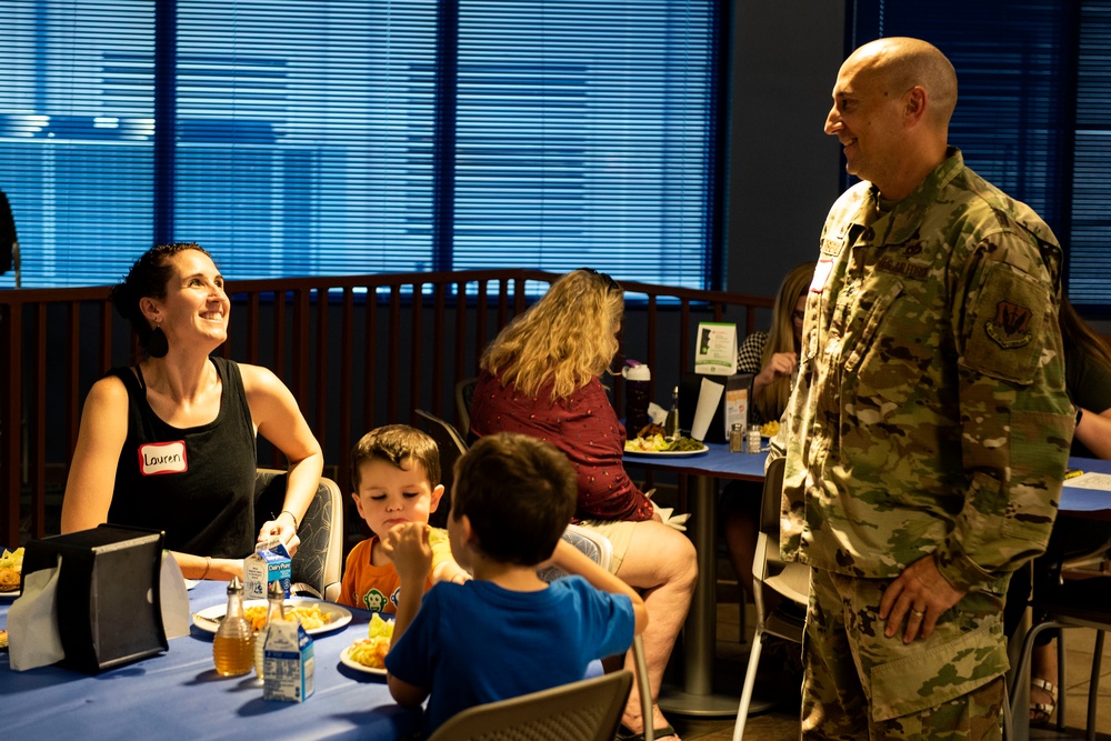 Families get served during Deployed Spouses Dinner