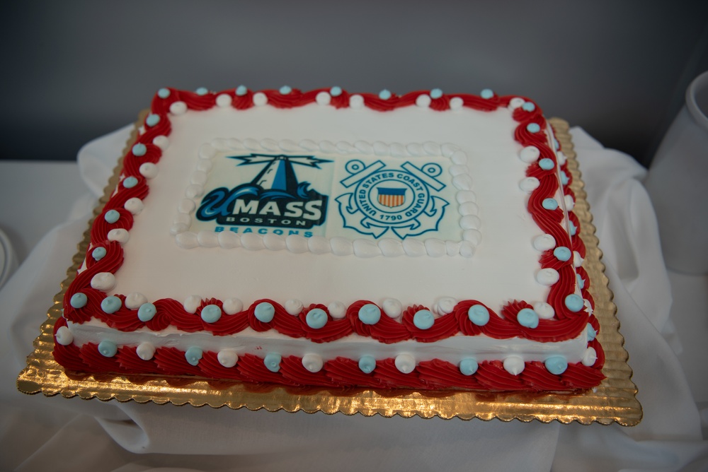 U.S. Coast Guard, UMass Boston celebrate memorandum of agreement with cake