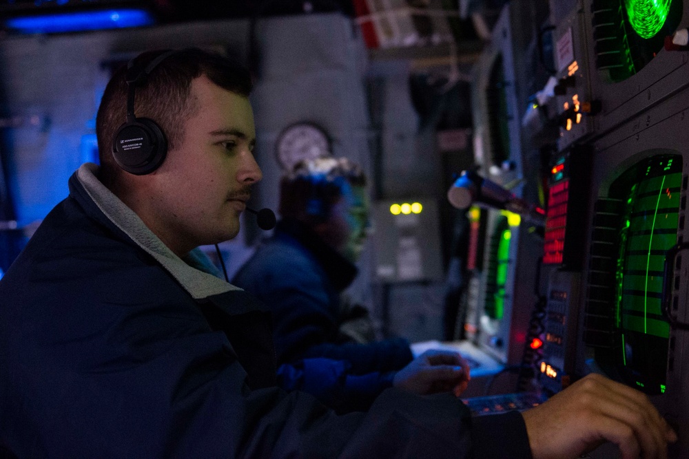 Sailors Aboard USS San Jacinto Use Sonar