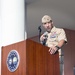 U.S. Naval Forces Europe-Africa Fleet Master Chief Derrick Walters delivers remarks during an all-hands call