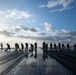 U.S. Sailors conduct a countermeasure washdown