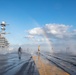 U.S. Sailors conduct a countermeasure washdown