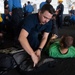 U.S. Sailors participate in a mass casualty drill