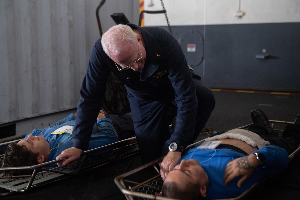 U.S. Sailors participate in a mass casualty drill