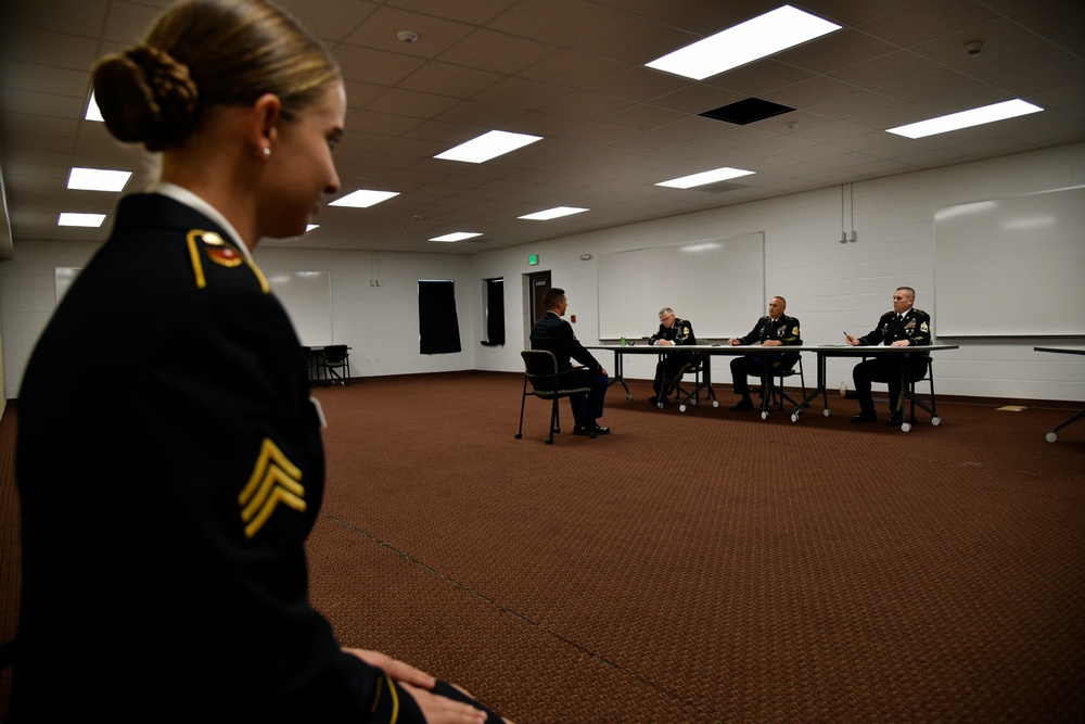 Sponsor looks on as her Soldier meets the Board