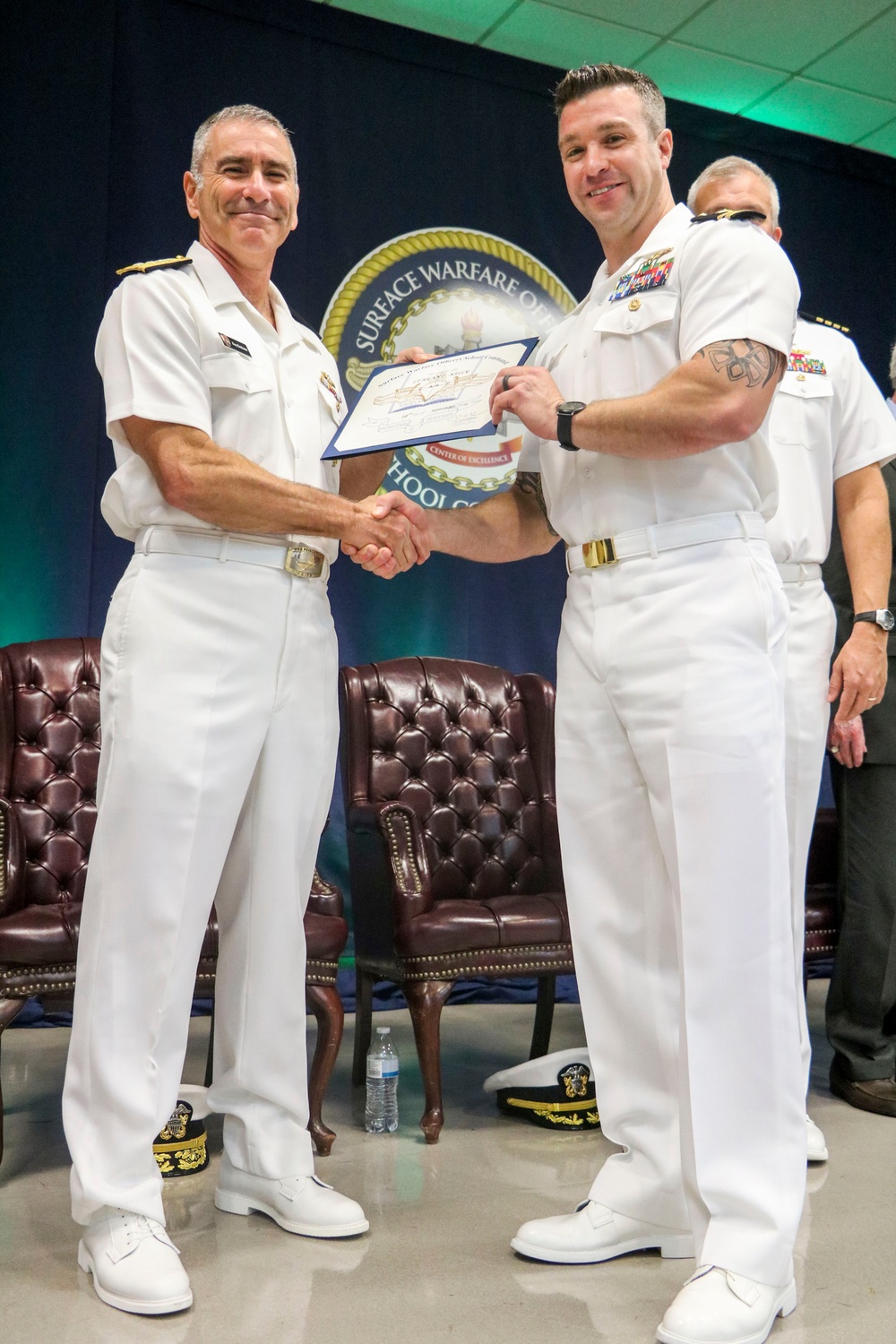 Rear Adm. Kitchener Visits SWOS, Addresses Graduates