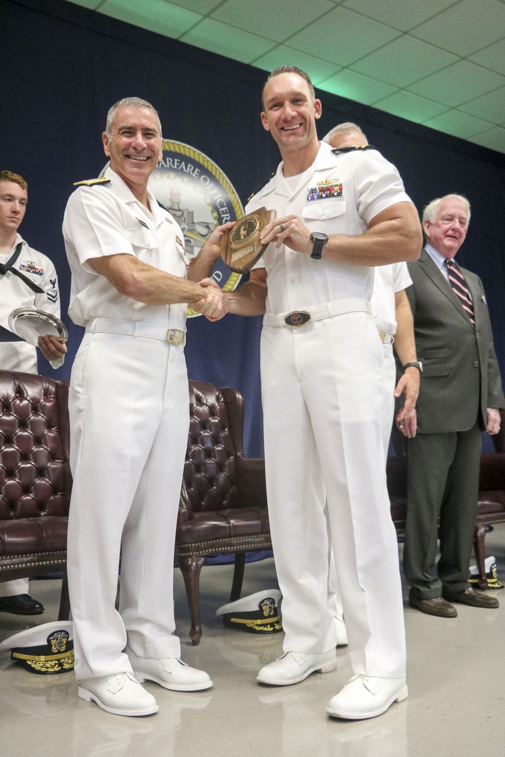 Rear Adm. Kitchener Visits SWOS, Addresses Graduates