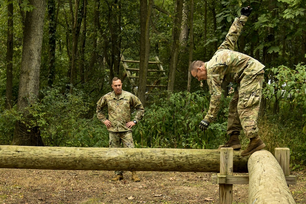 Log Balance on the Obstacle Course