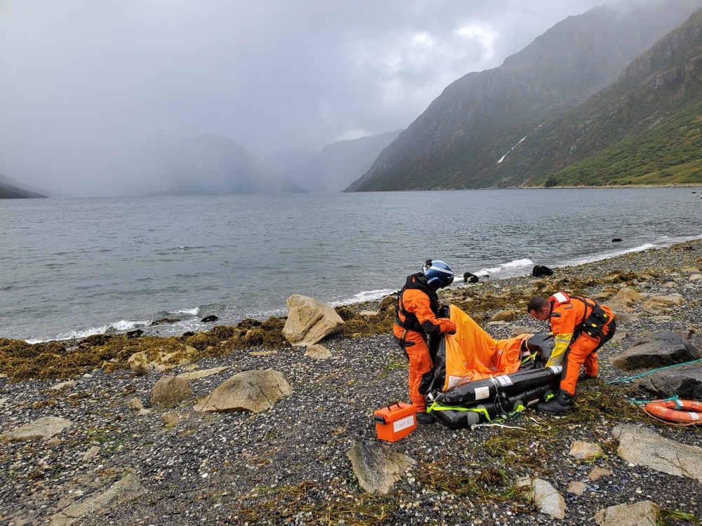 Coast Guard aircrew rescues hunter after vessel sinks in Three Saints Bay, Alaska