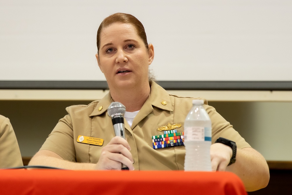 Lt. Cmdr. Meagan Makarenko, Executive Officer of USS Pioneer (MCM 9) answers questions about women leadership in the Navy, during the Women's Waterfront Symposium held on Sasebo Naval Base, Japan