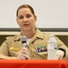 Lt. Cmdr. Meagan Makarenko, Executive Officer of USS Pioneer (MCM 9) answers questions about women leadership in the Navy, during the Women's Waterfront Symposium held on Sasebo Naval Base, Japan
