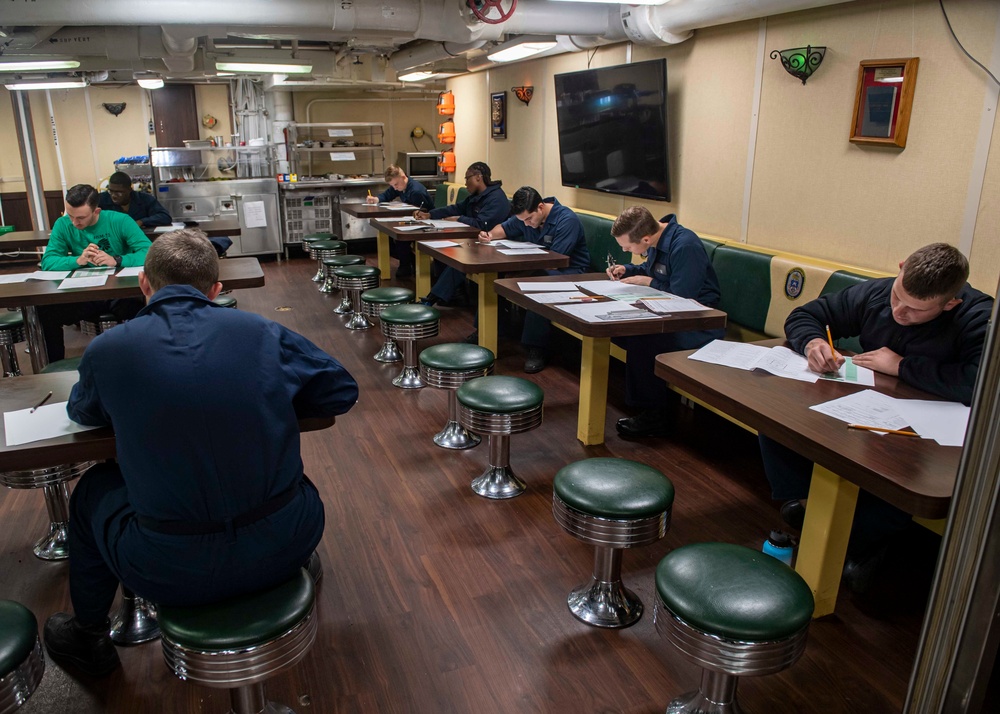 USS Normandy Sailors Take Advancement Exam