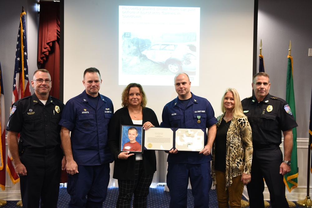 Coast Guard Sector Boston presents Welton family with Letter of Appreciation
