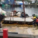 Coast Guard members conduct Spilled Oil Recovery System deployment training in Sitka, Alaska