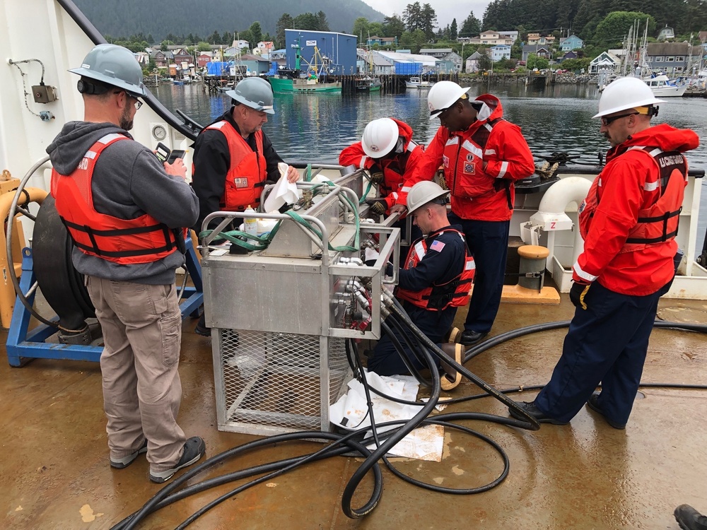 Coast Guard members conduct Spilled Oil Recovery System deployment training in Sitka, Alaska