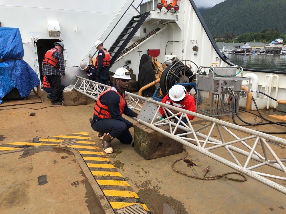 Coast Guard members conduct Spilled Oil Recovery System deployment training in Sitka, Alaska