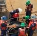 Coast Guard members conduct Spilled Oil Recovery System deployment training in Sitka, Alaska