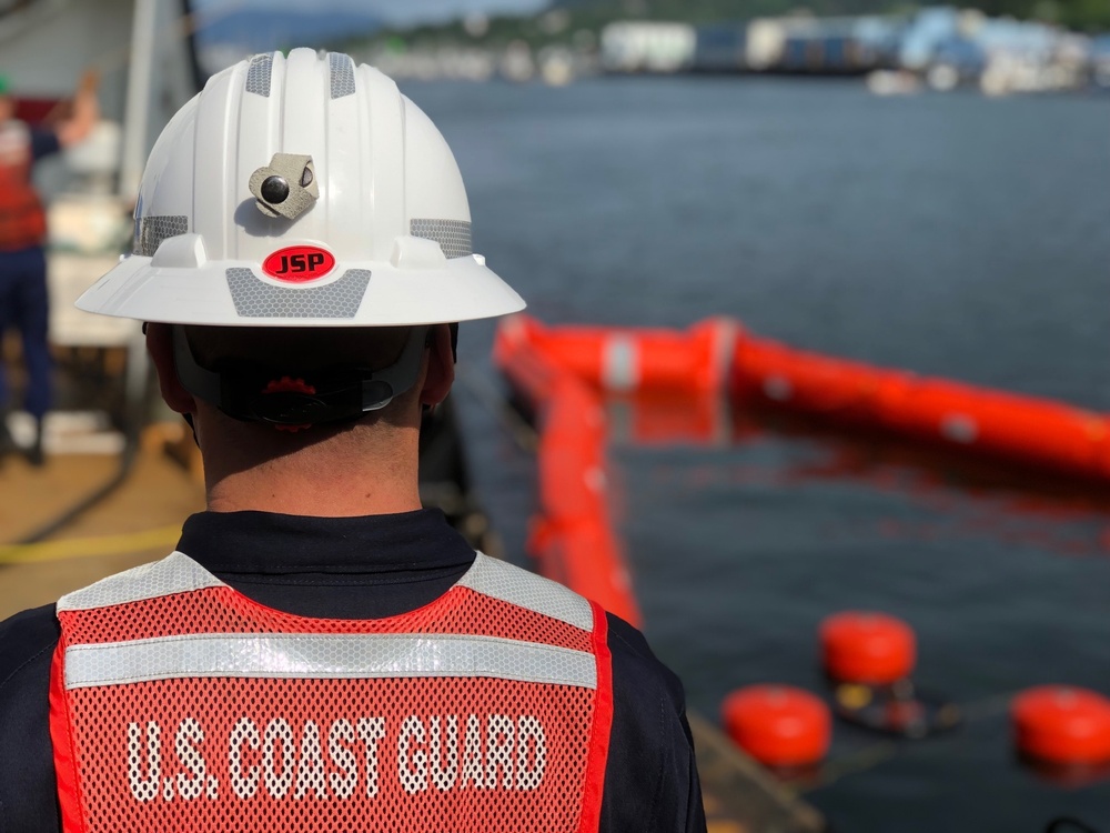 Coast Guard members conduct Spilled Oil Recovery System deployment training in Sitka, Alaska