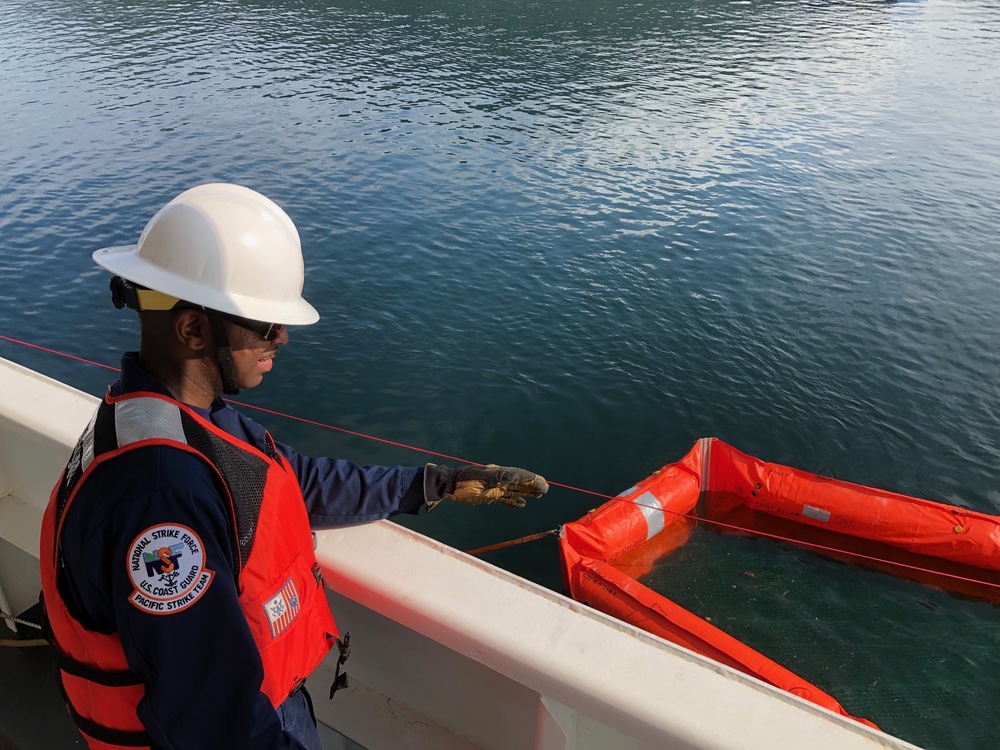 Coast Guard members conduct Spilled Oil Recovery System deployment training in Sitka, Alaska