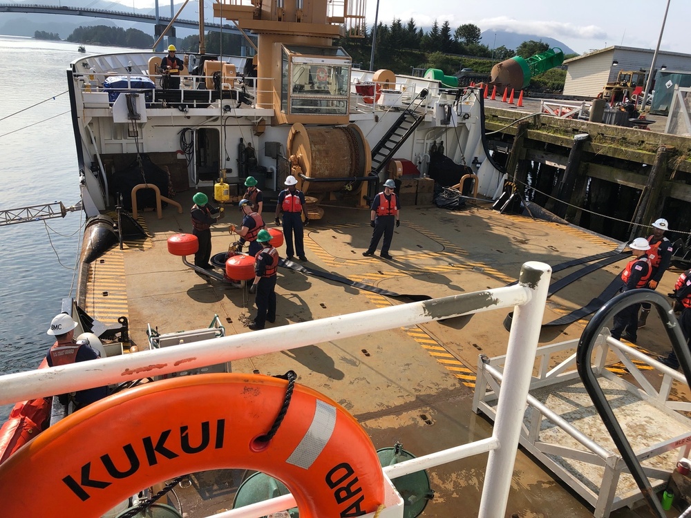 Coast Guard members conduct Spilled Oil Recovery System deployment training in Sitka, Alaska