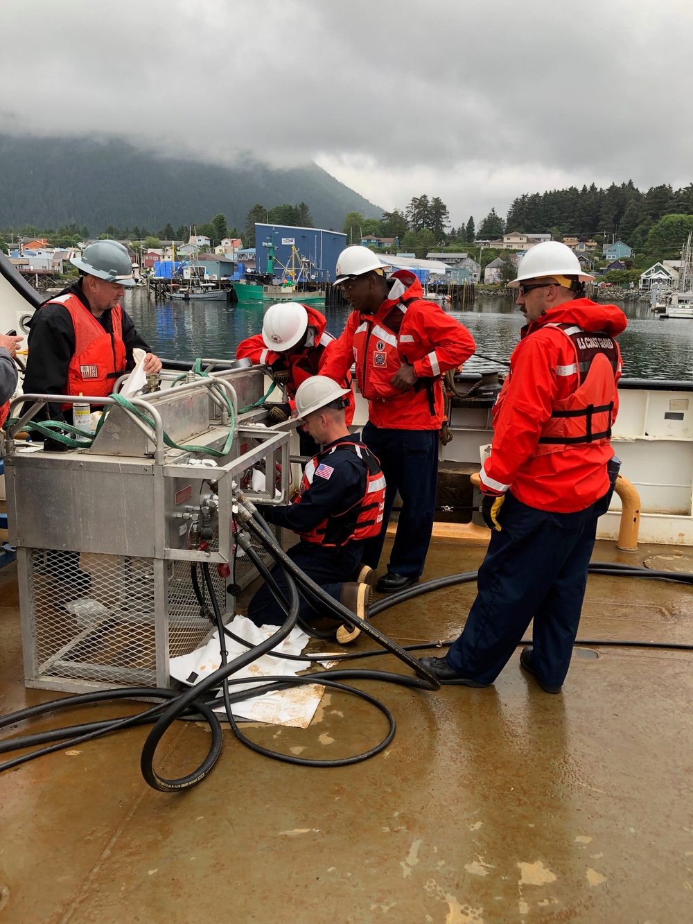 Coast Guard members conduct Spilled Oil Recovery System deployment training in Sitka, Alaska