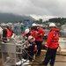 Coast Guard members conduct Spilled Oil Recovery System deployment training in Sitka, Alaska