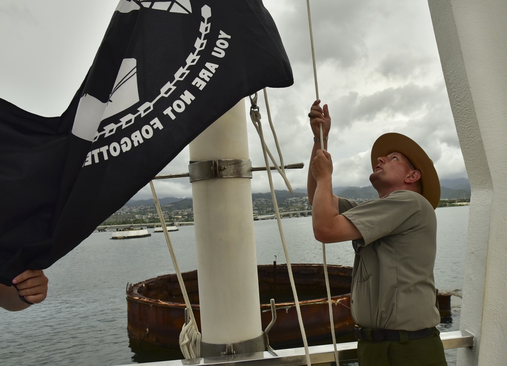 POW/MIA flag flies over USS Arizona Memorial