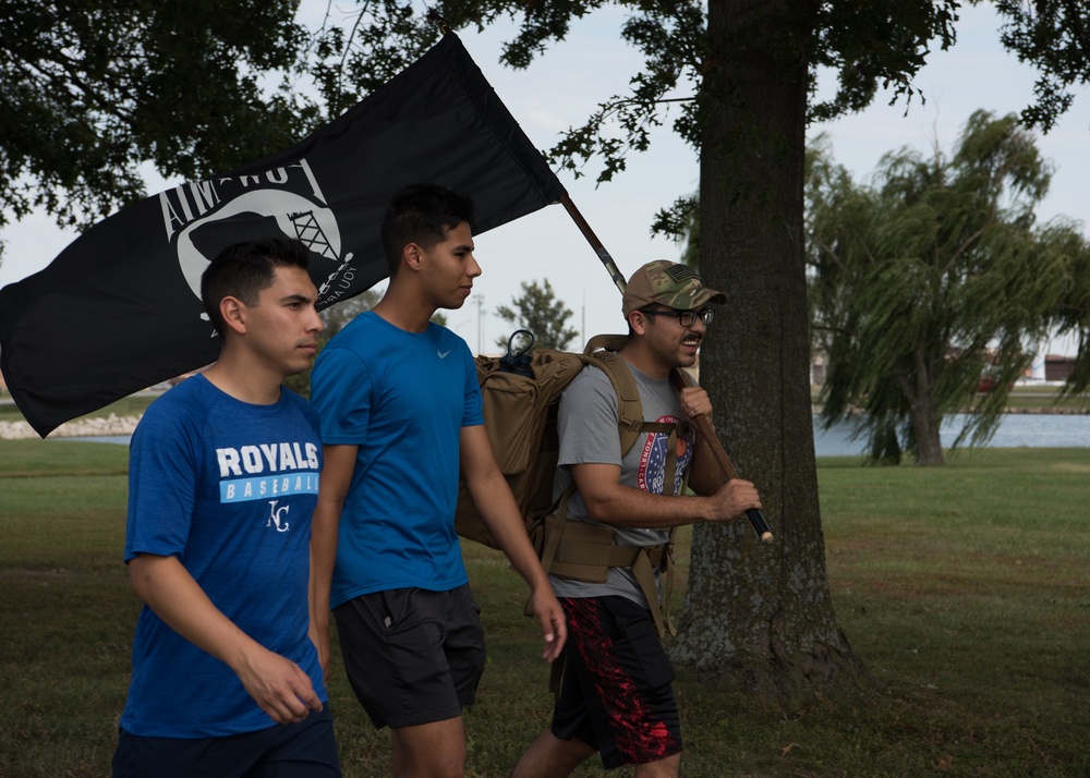 Members of Team Whiteman participate in POW/MIA ruck march, 5k