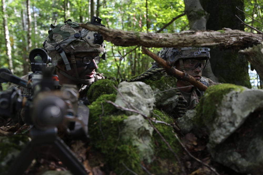 U.S. Soldiers scan their sector of fire during Saber Junction 19