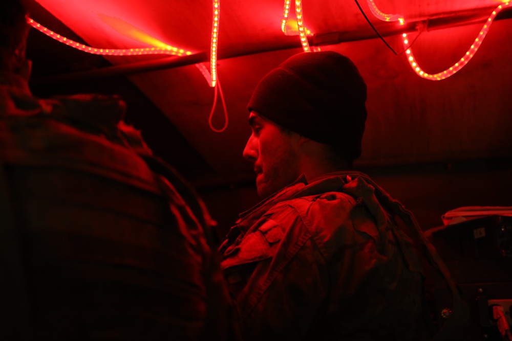 U.S. Soldiers await information from adjacent units during Saber Junction 19