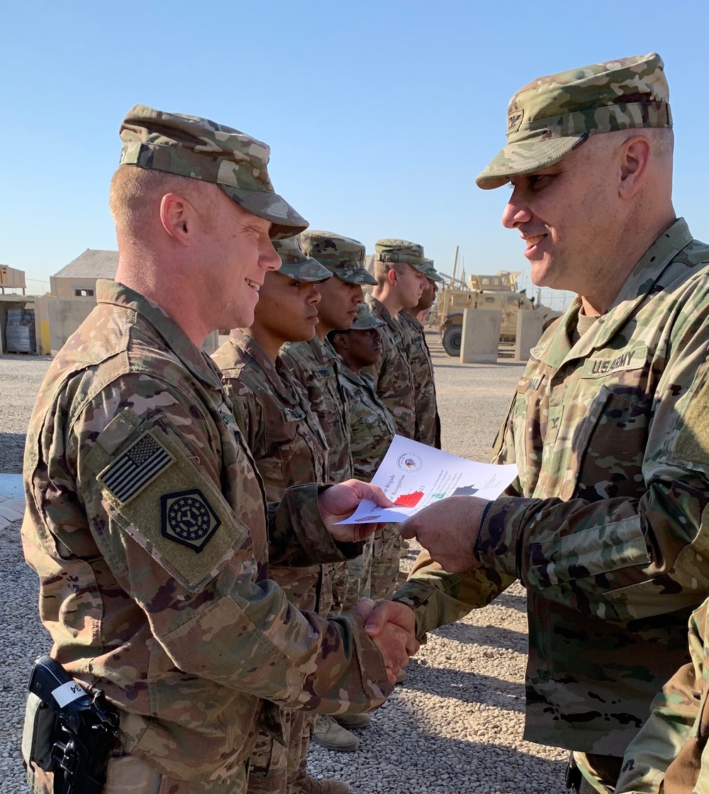 Deployed Illinois Soldiers Receive Combat Service Patch