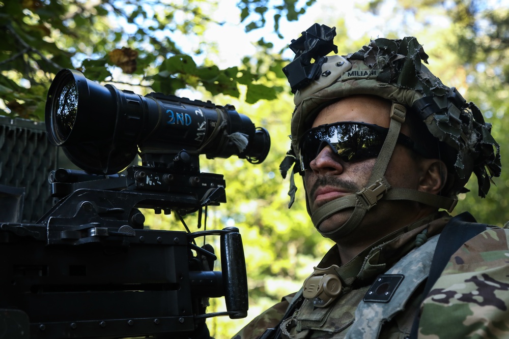 U.S. Army Spc. Jorge Miliani Saber scans his sector of fire during Junction 19