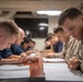 Sailors Take Advancement Exam Aboard USS Harpers Ferry