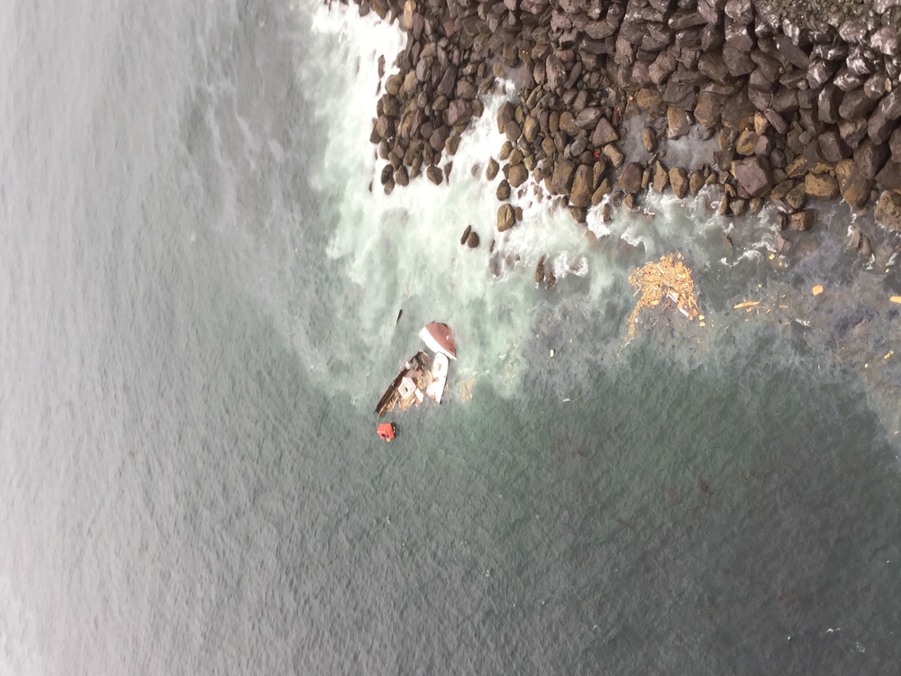 Coast Guard aircrew rescues 2 off Coos River jetty