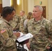 Lieutenant General Paul J. LaCamera, Commanding General of XVIII Airborne Corps and Fort Bragg, speaks with Staff Sergeant Alvin Singh