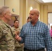 Lieutenant General Paul J. LaCamera, Commanding General of XVIII Airborne Corps and Fort Bragg, speaks with Robert Louden