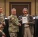 Dr. Alan Berkowitz is presented a Certificate of Appreciation by Lieutenant General Paul J. LaCamera, Commanding General of XVIII Airborne Corps and Fort Bragg