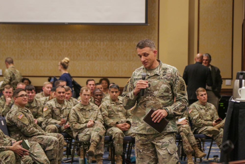 Command Sergeant Major Charles W. Albertson, Command Sergeant Major of XVIII Airborne Corps and Fort Bragg, addresses senior leaders following a panel discussion for the SHARP Leadership Forum.