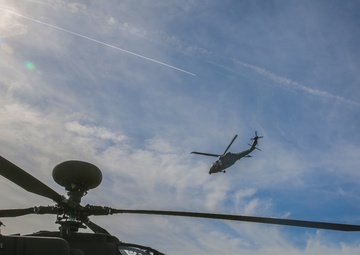 U.S. Soldiers fly an AH-64D Apache Longbow helicopter during Saber Junction 19