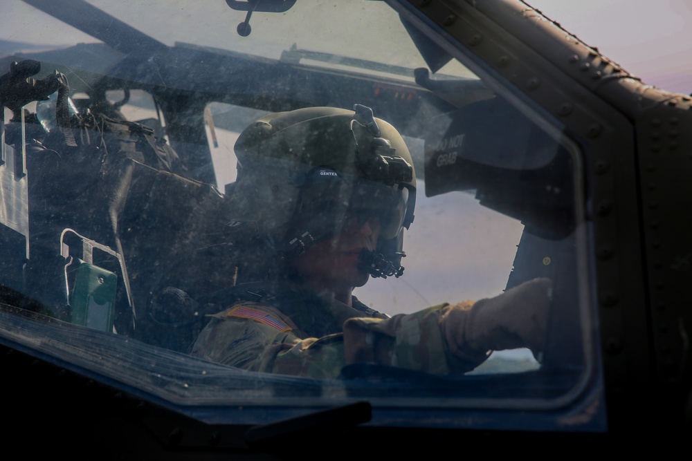 A U.S. Soldier operates a AH-64D Apache Longbow helicopter during Saber Junction 19