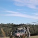 U.S. Soldiers conduct pre-flight checks on a UH-60 Blackhawk during Saber Junction 19