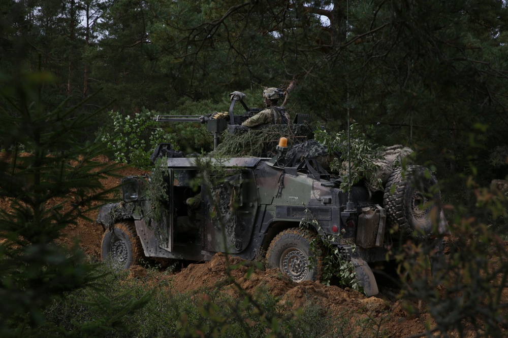 U.S. Soldiers defend their battle position during Saber Junction 19