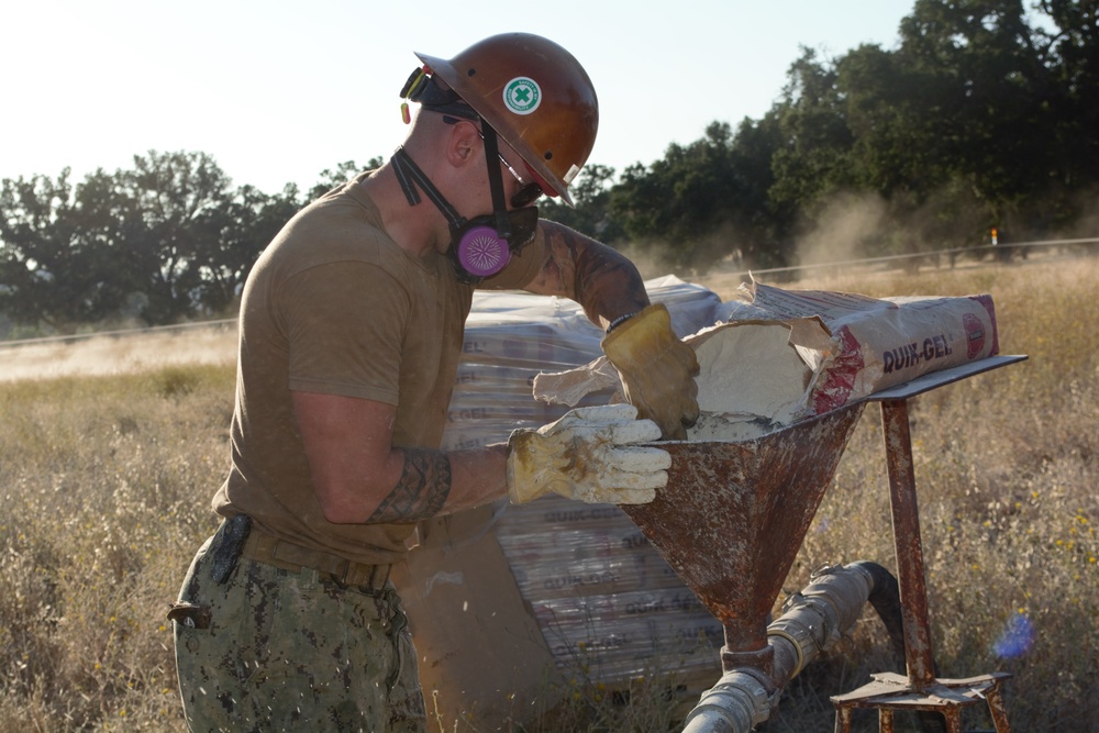 Naval Mobile Construction Battalion 5 Seabees participate in water well training