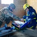 A U.S. Army Soldier works with with the Technisces Hilfswerk during Cobra Strike 2019