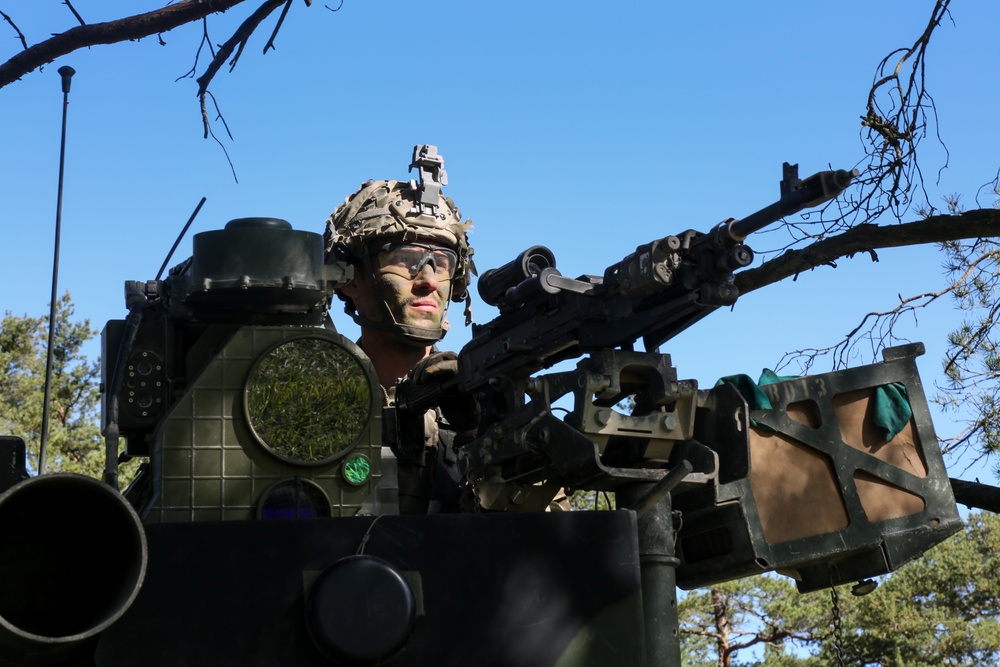 U.S. Soldiers hold a battle position during Saber Junction 19